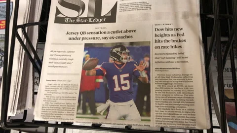 Newspaper Coverage of the Tommy DeVito Rising Star in New Jersey for NY Giants Stock Footage 259646954