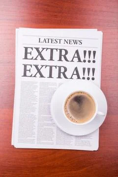 The newspaper extra! extra!  and coffee Stock Photos