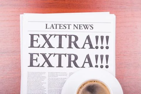 The newspaper extra! extra!  and coffee Stock Photos