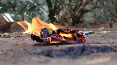 Newspaper on fire Stock Footage 153657377