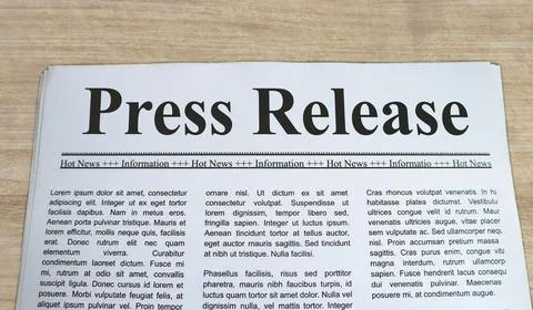 A newspaper with the headline Press Release Stock Photos
