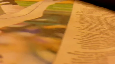 Newspaper Pan Shot (HD) Stock Footage 11287123