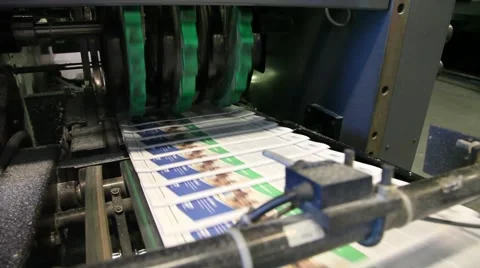Newspaper Press, Fast moving paper on a roll in a printing factory 動画素材 45360660