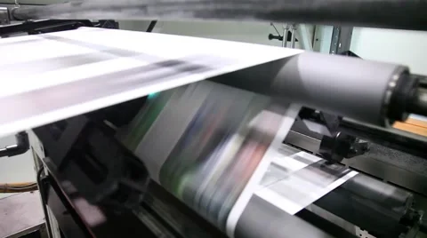 Newspaper Press, Fast moving paper on a roll in a printing factory 動画素材 45361476