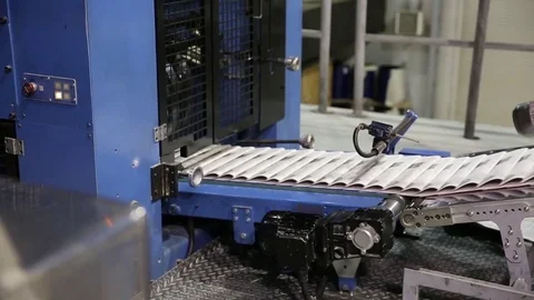 Newspaper print process. Shooting of the publishing business from a close distan Stock-Footage 75452221