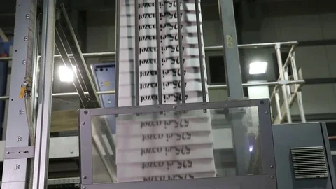 Newspaper print process. Shooting of the publishing business from a close distan Stock-Footage 75452258