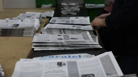 Newspaper print process. Shooting of the publishing business from a close distan Stock-Footage 75452463