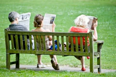 Newspaper readers Stock Photos