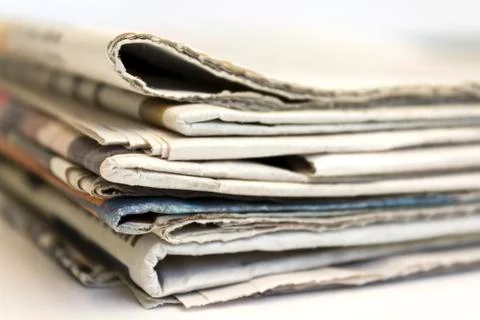 Newspaper stack Stock Photos