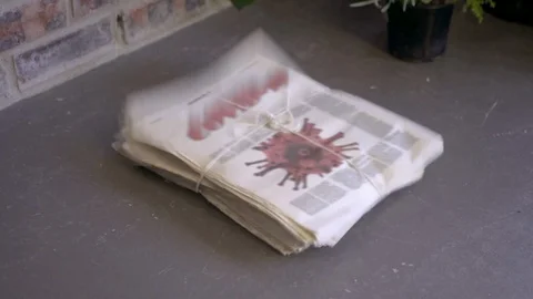 Newspaper title COVID-19 front page image corona virus falling floor Stock Footage 126135976