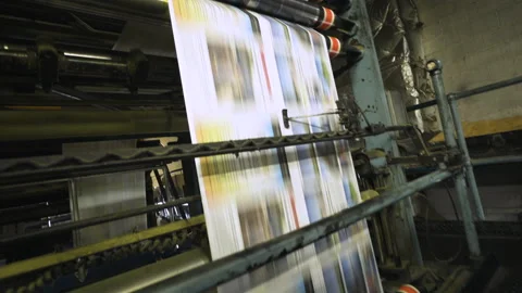 Newspapers being printed at a printing press Stock Footage 130754586