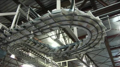 Newspapers flow along an assembly line in a newspaper factory. 库存影片 554056
