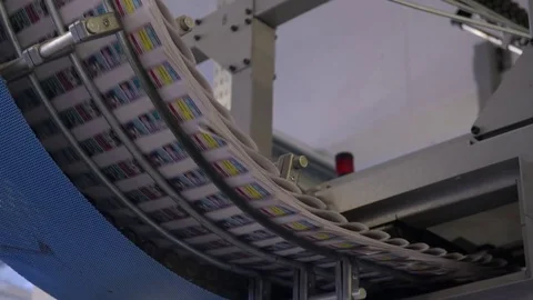 Newspapers Flow Along An Assembly Line. Stock Footage 71304842