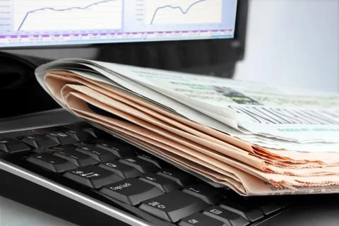 Newspapers on the Keyboard Stock Photos