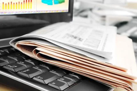 Newspapers on the Keyboard Stock Photos
