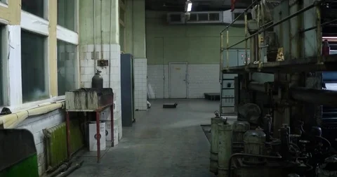 Newspapers move along an assembly line in a factory Stockbeeldmateriaal 79957437