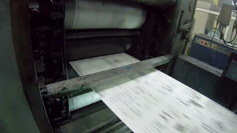 Newspapers Offset Web Printing units and roll of paper moving fast Stock Footage 94667061