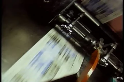Newspapers printing during press run at printing plant Stock-Footage 11353529