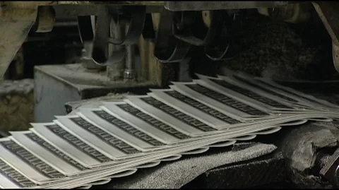 Newspapers on Printing Press Stock Footage 93876888