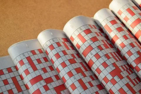 Newspapers with puzzles Stock Photos