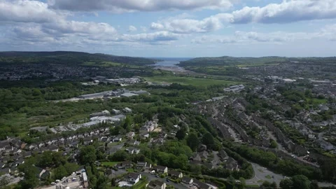 Newton Abbot, Devon, England: DRONE AERIAL VIEWS: Houses &amp; River Teign Stock Footage 241337859