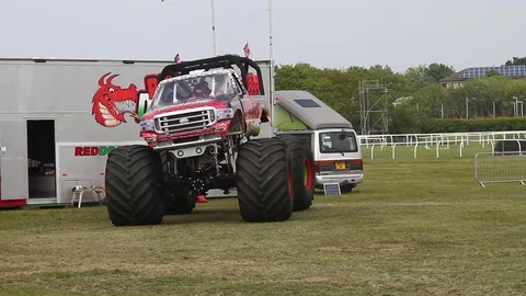 Newton Abbot, Devon: Red Dragon monster truck gives customers a ride (NO AUDIO) Stock Footage 127866694