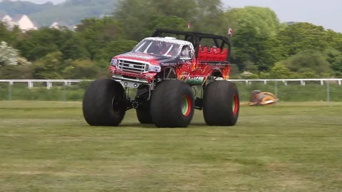 Newton Abbot, Devon: Red Dragon monster truck gives customers a ride (NO AUDIO) Stock Footage 127998469
