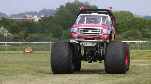 Newton Abbot, Devon: Red Dragon monster truck gives customers a ride (NO AUDIO) Stock Footage 127999657
