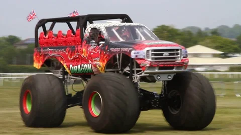 Newton Abbot, Devon: Red Dragon monster truck gives customers a ride (NO AUDIO) Stock Footage 127999866