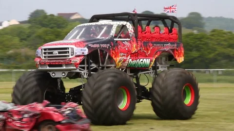 Newton Abbot, Devon: Red Dragon monster truck gives customers a ride (NO AUDIO) Stock Footage 128000024