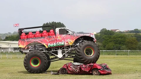 Newton Abbot, Devon: Red Dragon monster truck gives customers a ride (NO AUDIO) Stock Footage 128000288