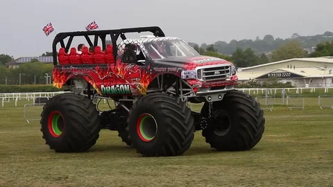 Newton Abbot, Devon: Red Dragon monster truck gives customers a ride (NO AUDIO) Stock Footage 128001002