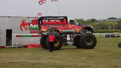 Newton Abbot, Devon: Red Dragon monster truck gives customers a ride (NO AUDIO) Stock Footage 128001265