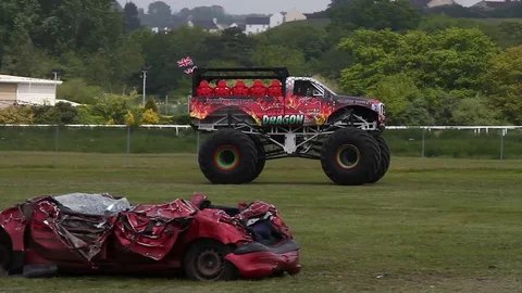 Newton Abbot, Devon: Red Dragon monster truck gives customers a ride Stock Footage 128001330