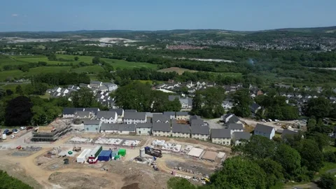 Newton Abbot, S. Devon, England: DRONE VIEWS: New build house construction site Stock Footage 241905619