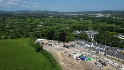 Newton Abbot, S. Devon, England: DRONE VIEWS: New build house construction site Stock Footage 241906133