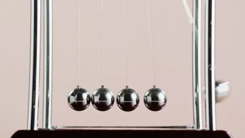 Newton balls close-up, five metallic pendulums on pink background, cradle Stock Footage 218272047