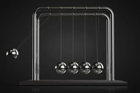 Newton's cradle in action. Dark background. Foto stock