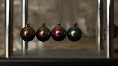 Newton’s Cradle Balls Swinging at Normal Speed Stock-Footage 344208128