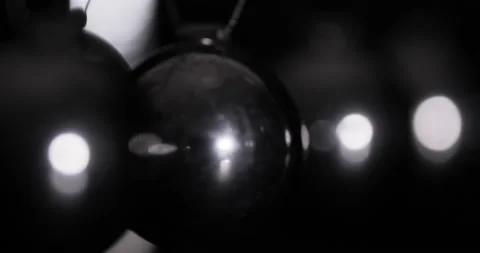 Newton's Cradle in Close-Up. Pendulum Wave. Metal Balls Stock Footage 138503183