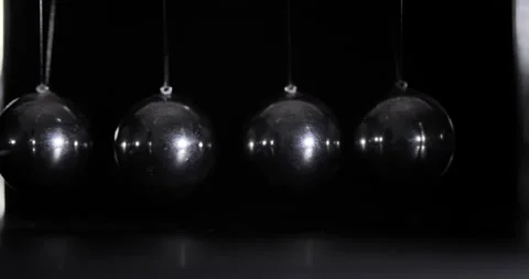 Newton's Cradle in Close-Up. Pendulum Wave. Metal Balls Stock Footage 138503673