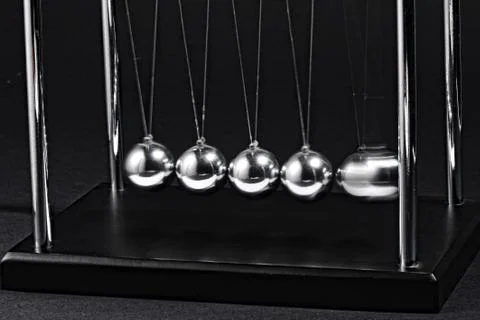 Newtons cradle Stock Photos