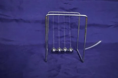 Newtons cradle Stock Photos