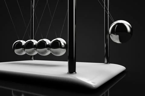 Newton's pendulum in action. Close-up. Stock Photos