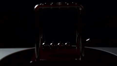 Newton's pendulum on a dark background works Stock Footage 135920947