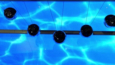 Newton's pendulum or cradle balance ball. Stock Footage 294075821