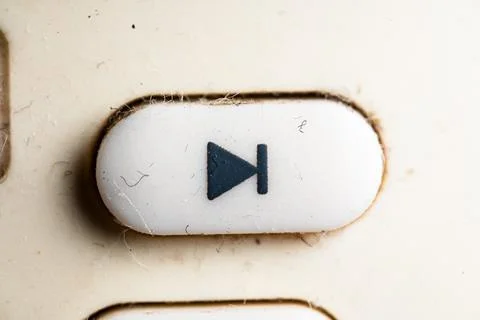Next icon and button close up of a old Television remote controller Stock-Fotos