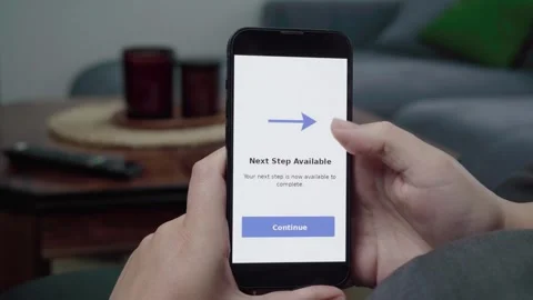 Next Step Available App Notification on Mobile Phone at Home Stock Footage 343718148
