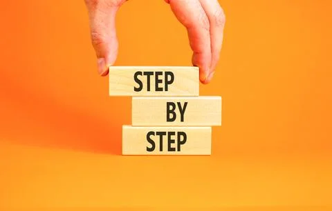 Next step words symbol. Concept words Step by step on beautiful wooden bloc.. 写真素材