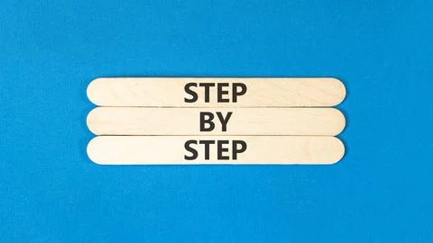 Next step words symbol. Concept words Step by step on beautiful wooden stic.. 写真素材